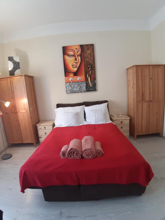 Posteľ alebo postele v izbe v ubytovaní MiniBali Apartmanok
