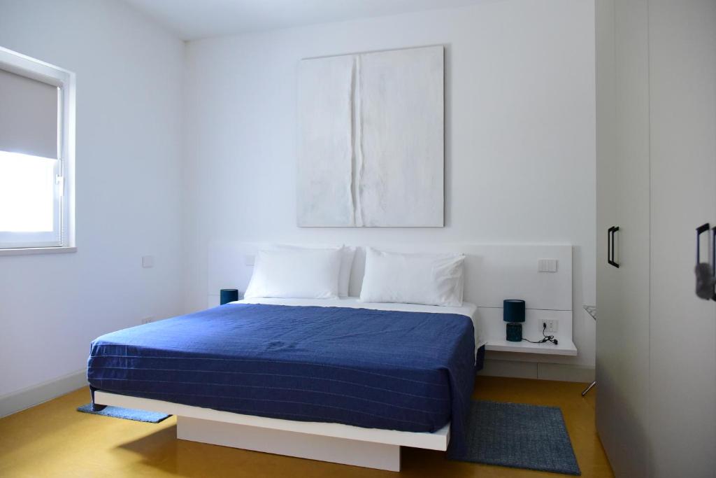 Postel nebo postele na pokoji v ubytování HMO Glamping & Suites in Vignanotica