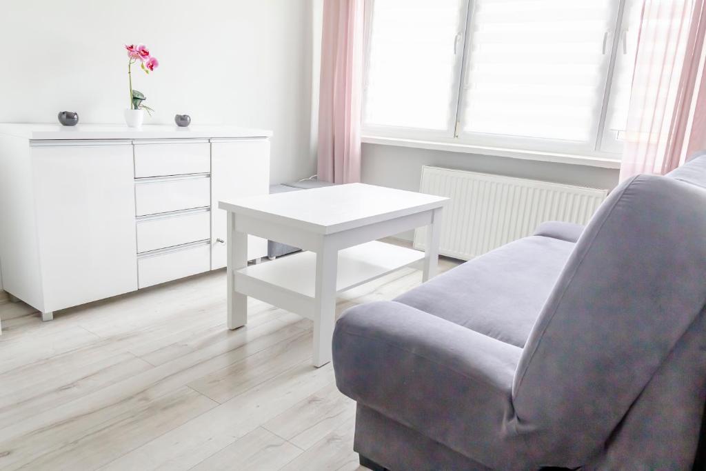 Posedenie v ubytovaní AL-DOM Apartamenty Apartament IZI