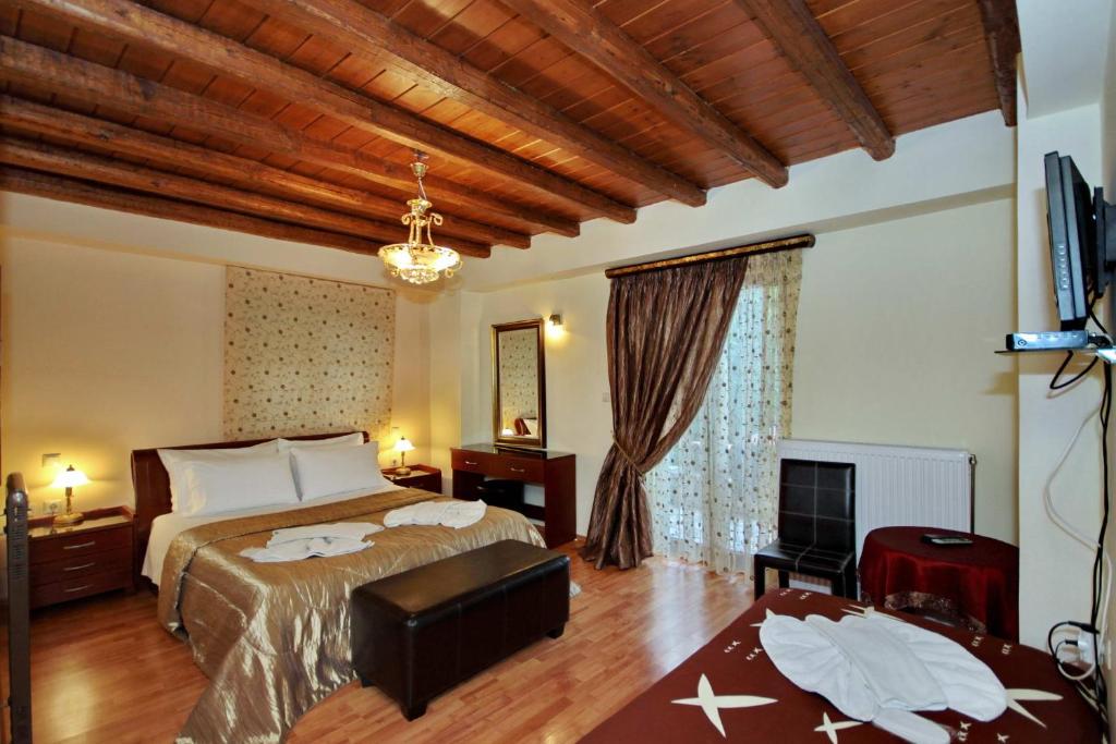Postel nebo postele na pokoji v ubytování Guesthouse Stemnitsa