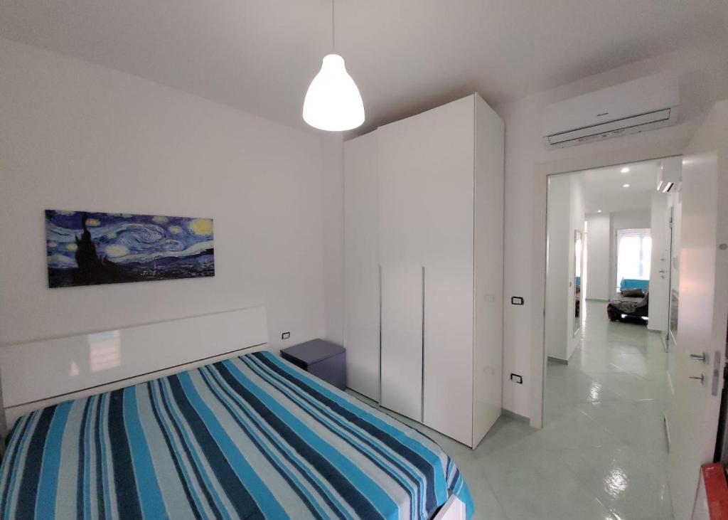 Postel nebo postele na pokoji v ubytování Scauri Inn