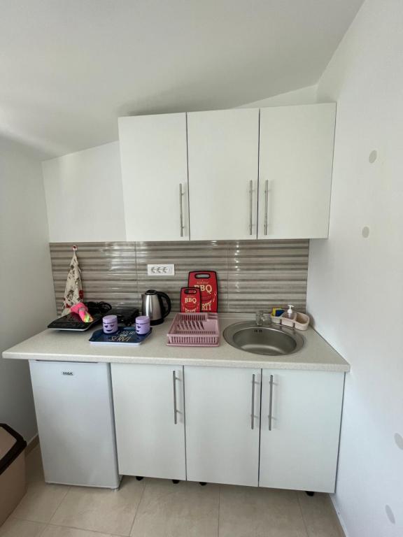 Kuchyň nebo kuchyňský kout v ubytování MIT-Apartments