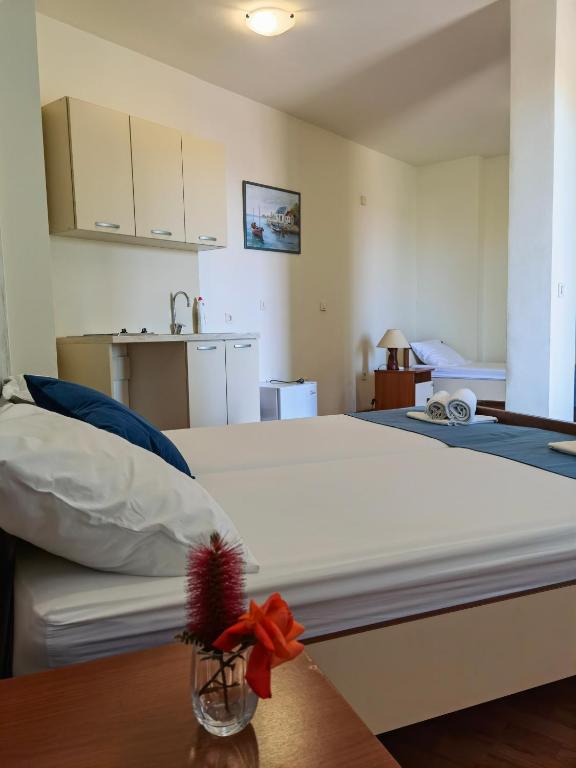 Postel nebo postele na pokoji v ubytování Residence Bella