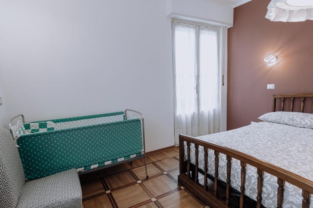 Łóżko lub łóżka w pokoju w obiekcie Appartamento Picche