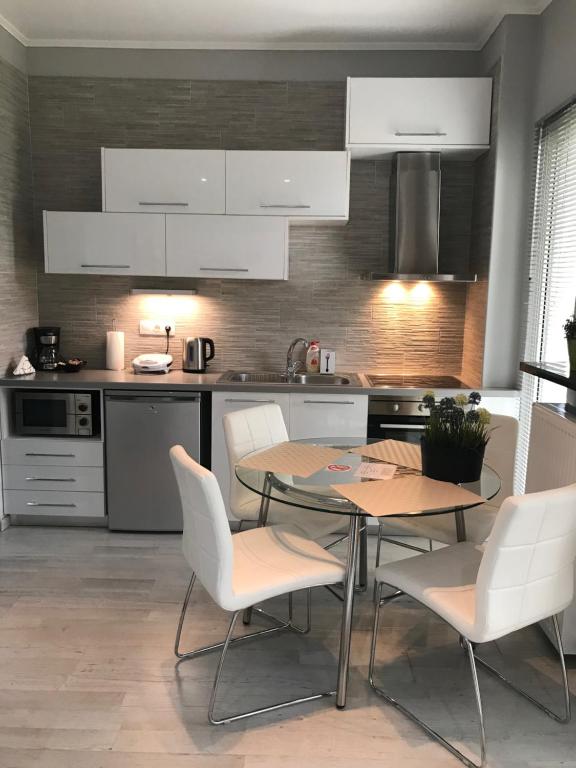 Kuchyňa alebo kuchynka v ubytovaní Urban Residence