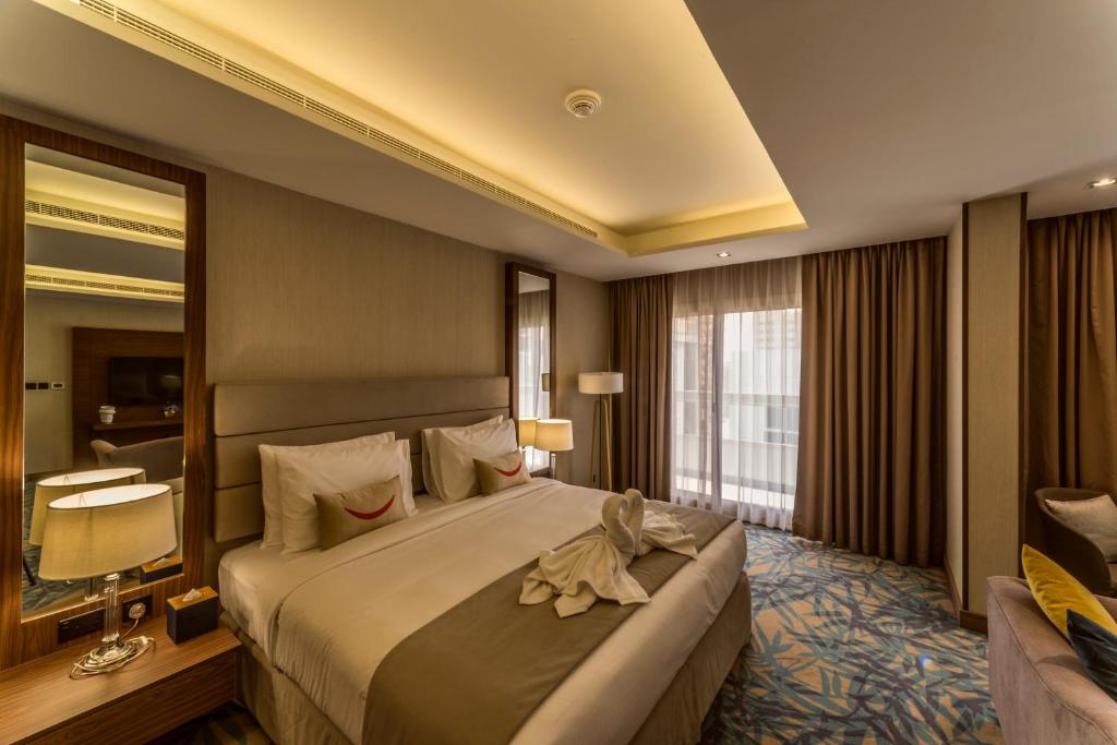 MENA Plaza Hotel Albarsha At The Mall - Resim 39