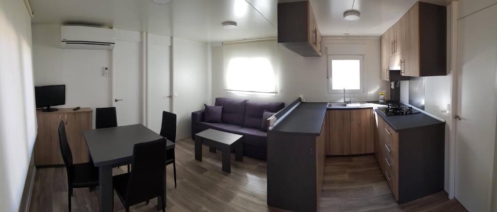 Kuchyň nebo kuchyňský kout v ubytování Camping Vall de Ribes