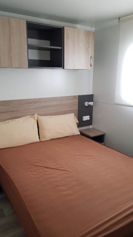 Postel nebo postele na pokoji v ubytování Camping Vall de Ribes