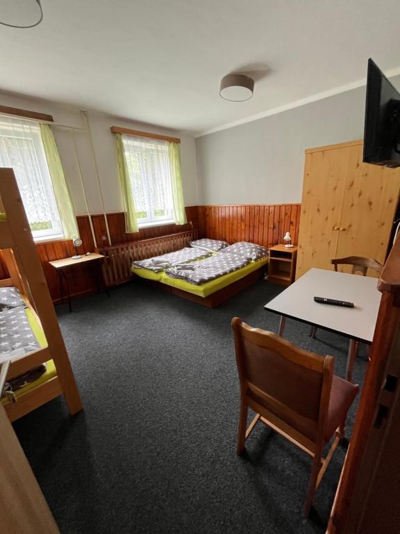 TV a/nebo společenská místnost v ubytování Pension Martinské údolí - dependance