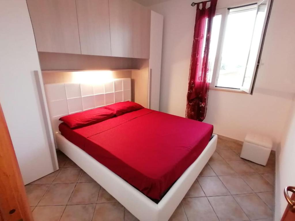 Postel nebo postele na pokoji v ubytování Case Vacanze Vista Mare