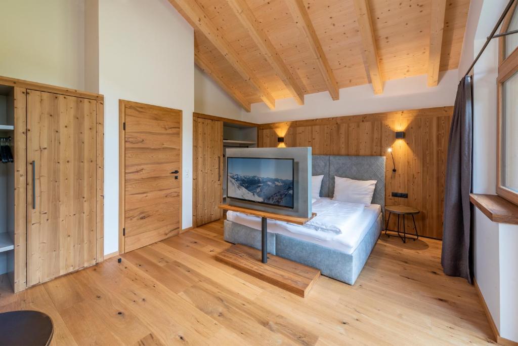 Postel nebo postele na pokoji v ubytování Griena NaturChalets ****