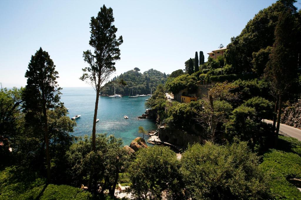 a view of a river with boats in the water at Hotel Piccolo Portofino in Portofino