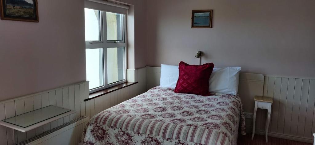 Postel nebo postele na pokoji v ubytování Teac Campbell Guesthouse
