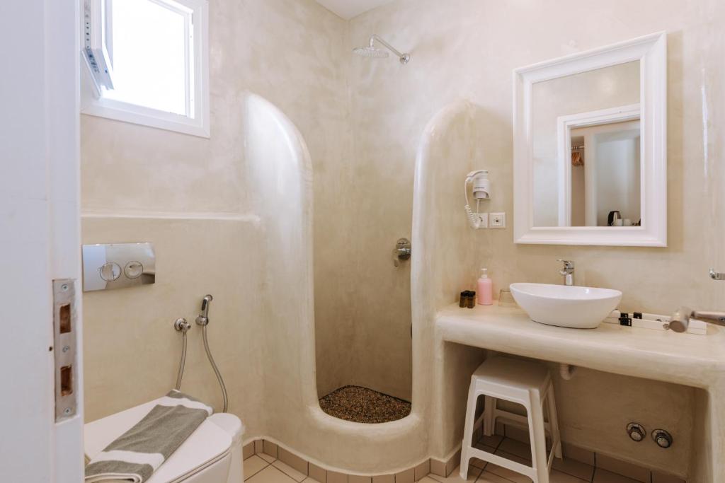 Kúpeľňa v ubytovaní Naxian Emerald Hotel