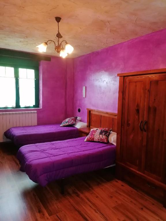 Postel nebo postele na pokoji v ubytování Hostería Casa Flor