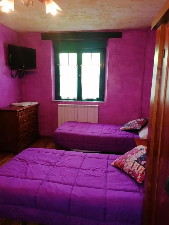 Postel nebo postele na pokoji v ubytování Hostería Casa Flor