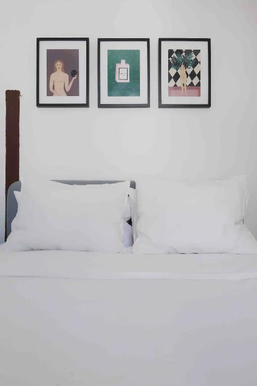 Postel nebo postele na pokoji v ubytování Qué bueno que viniste Plasencia Edificio Singular