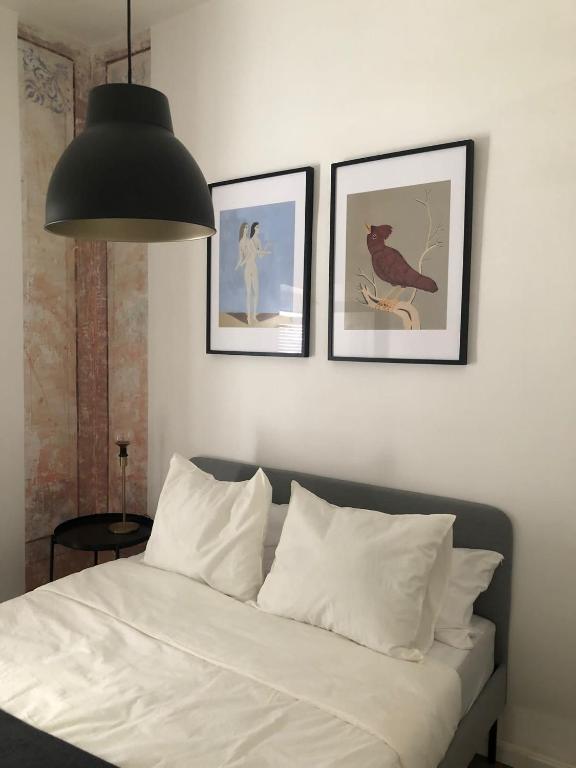 Postel nebo postele na pokoji v ubytování Qué bueno que viniste Plasencia Edificio Singular