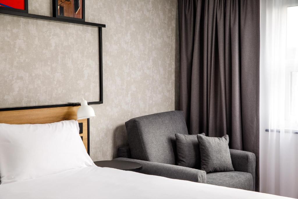 Postel nebo postele na pokoji v ubytování ibis Wakefield East-Castleford