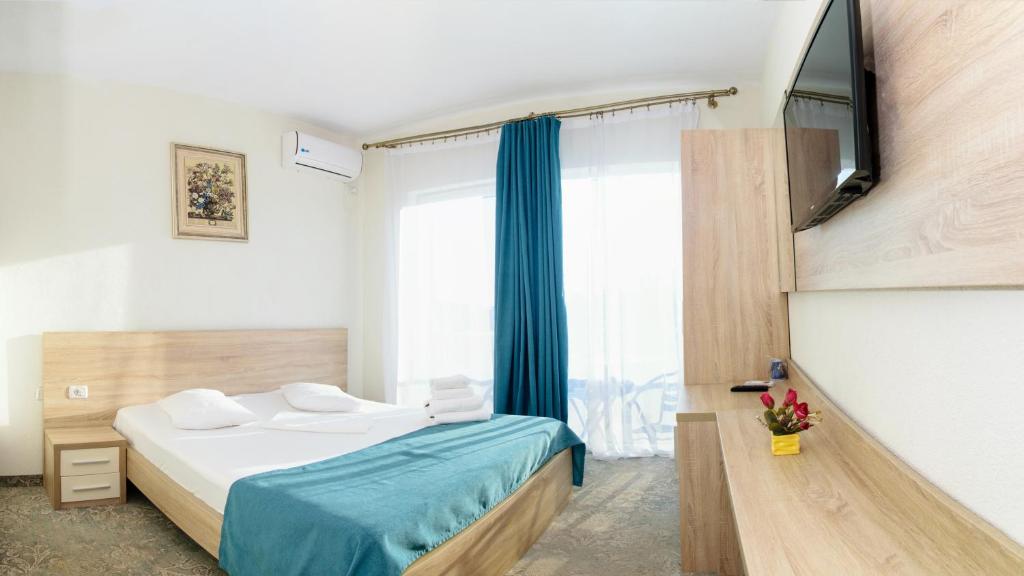 Postel nebo postele na pokoji v ubytování Hotel Union