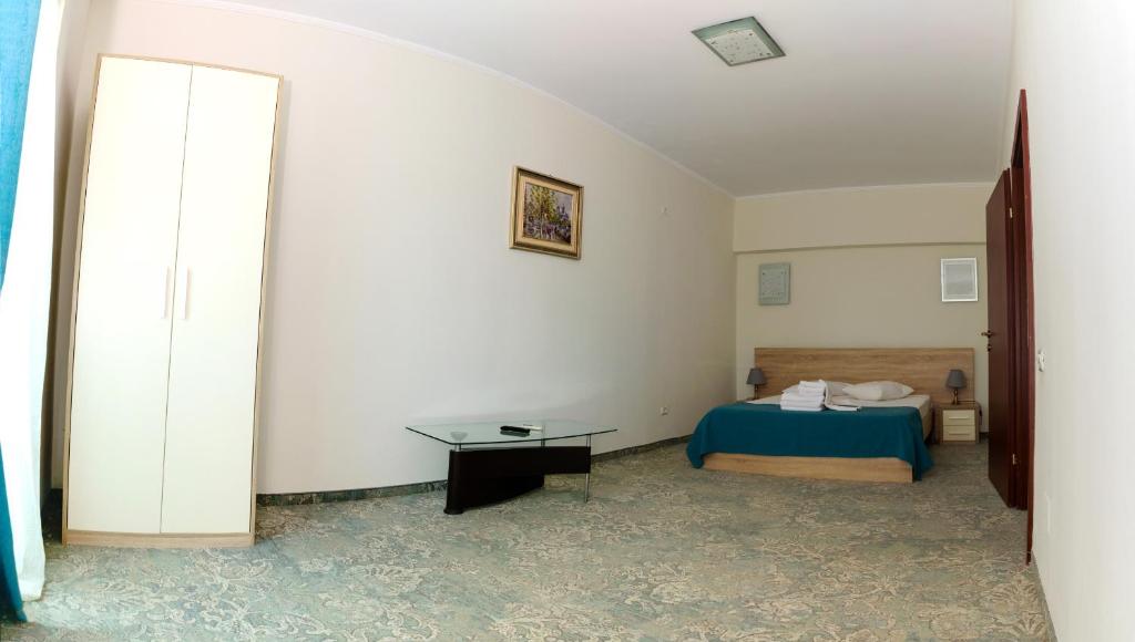 Postel nebo postele na pokoji v ubytování Hotel Union