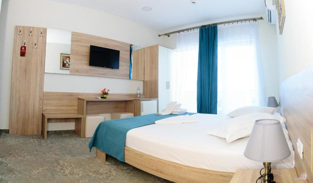 Postel nebo postele na pokoji v ubytování Hotel Union