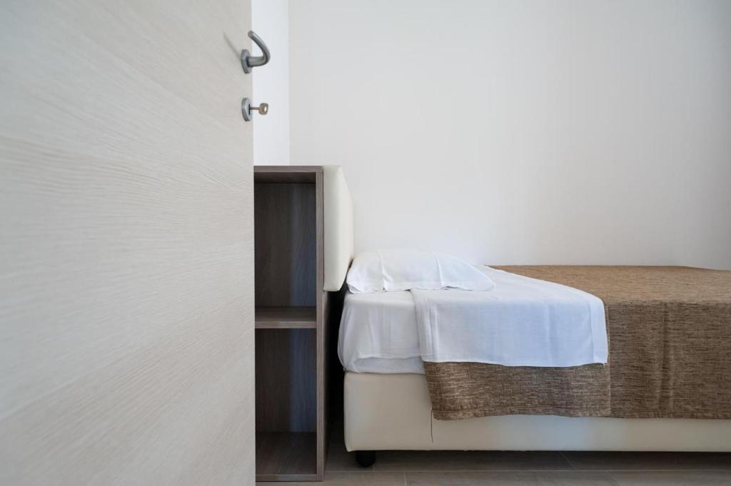 A bed or beds in a room at Sul Calar del Sole al Conero