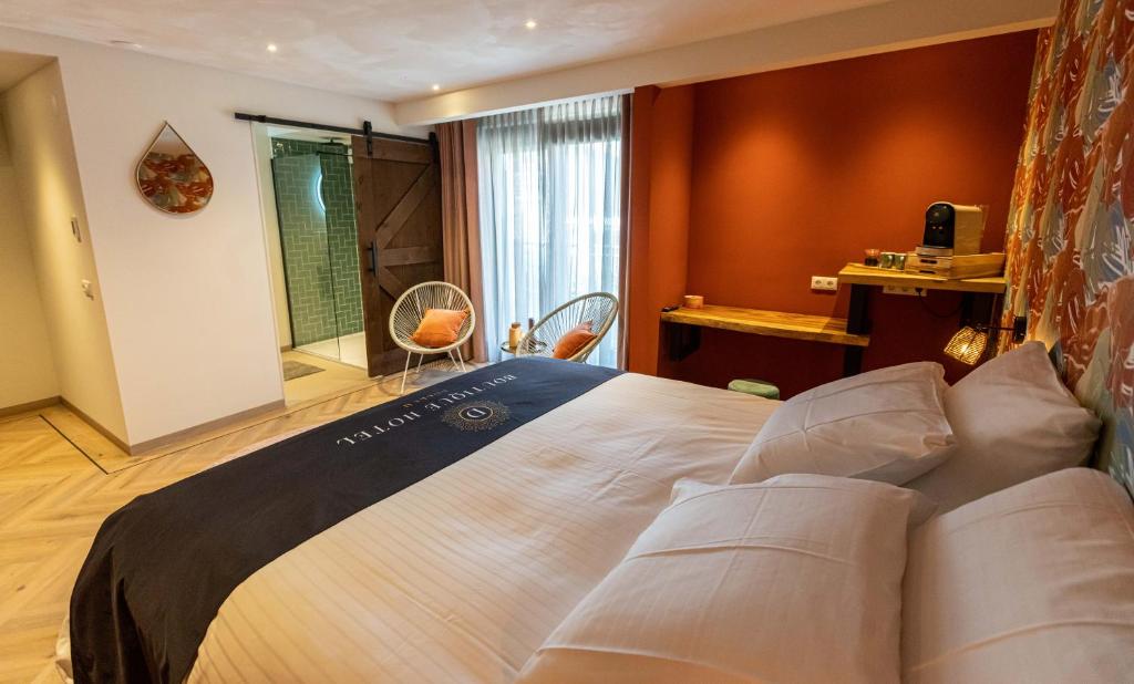 Postel nebo postele na pokoji v ubytování Boutiquehotel Dokkum