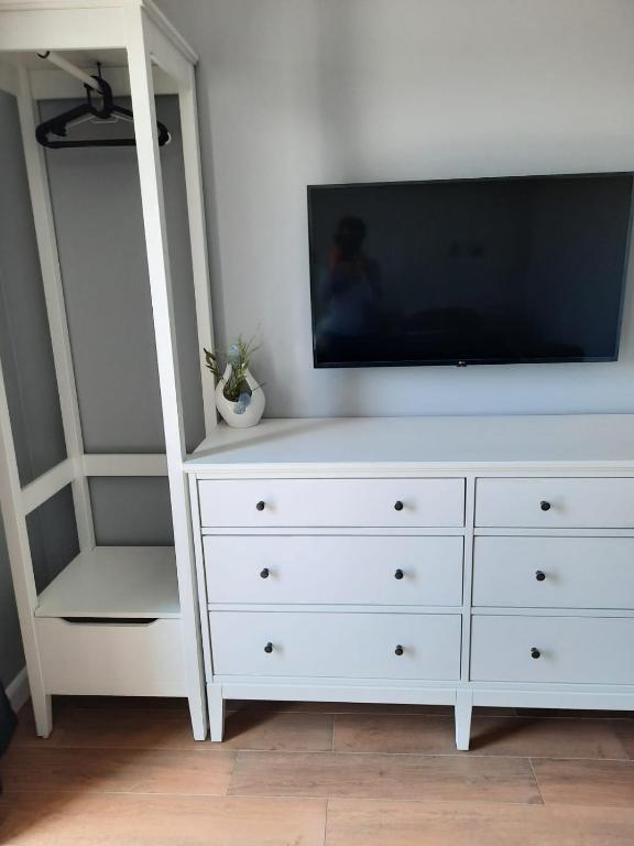 TV a/nebo společenská místnost v ubytování Rybacka
