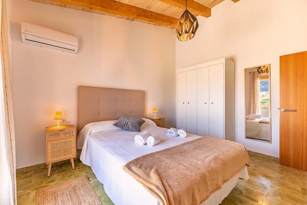 Postel nebo postele na pokoji v ubytování Villa Font 39 by Sealand Villas
