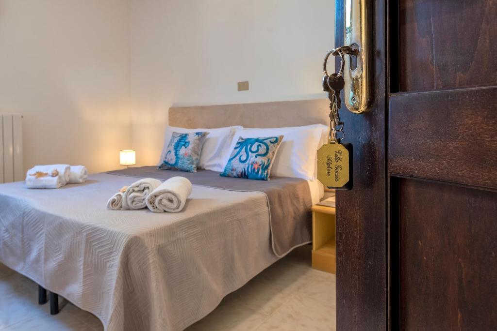 Postel nebo postele na pokoji v ubytování Villa Grazia