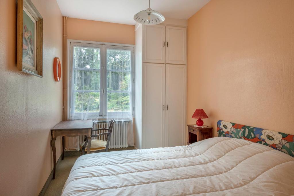 Posteľ alebo postele v izbe v ubytovaní Maison familiale dans les pins à 300 m de la Plage
