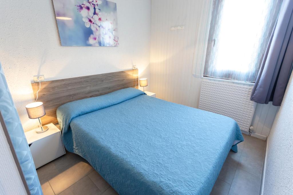 Postel nebo postele na pokoji v ubytování Grizzli Pedrous