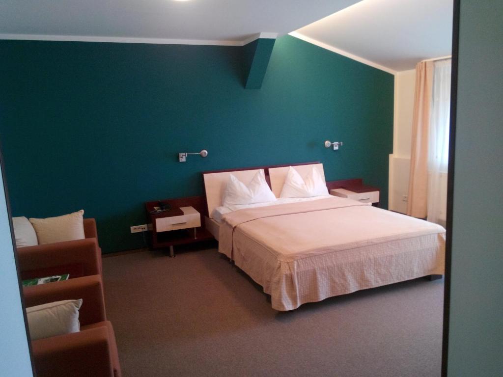 Postel nebo postele na pokoji v ubytování Hotel Baneasa Parc