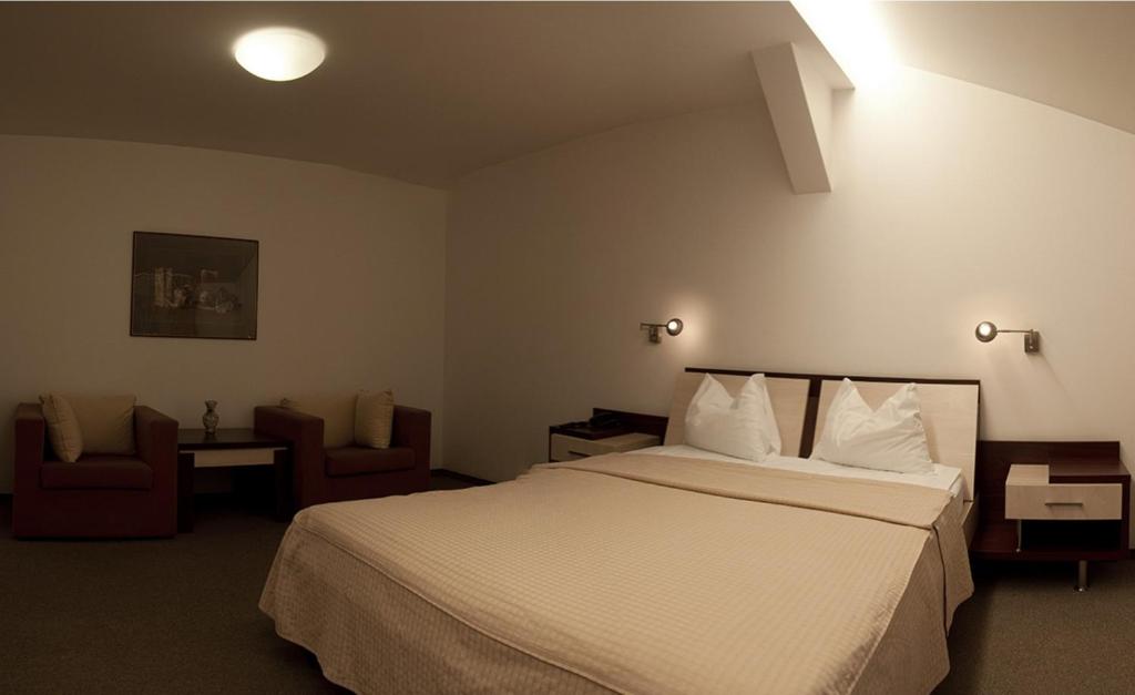 Postel nebo postele na pokoji v ubytování Hotel Baneasa Parc