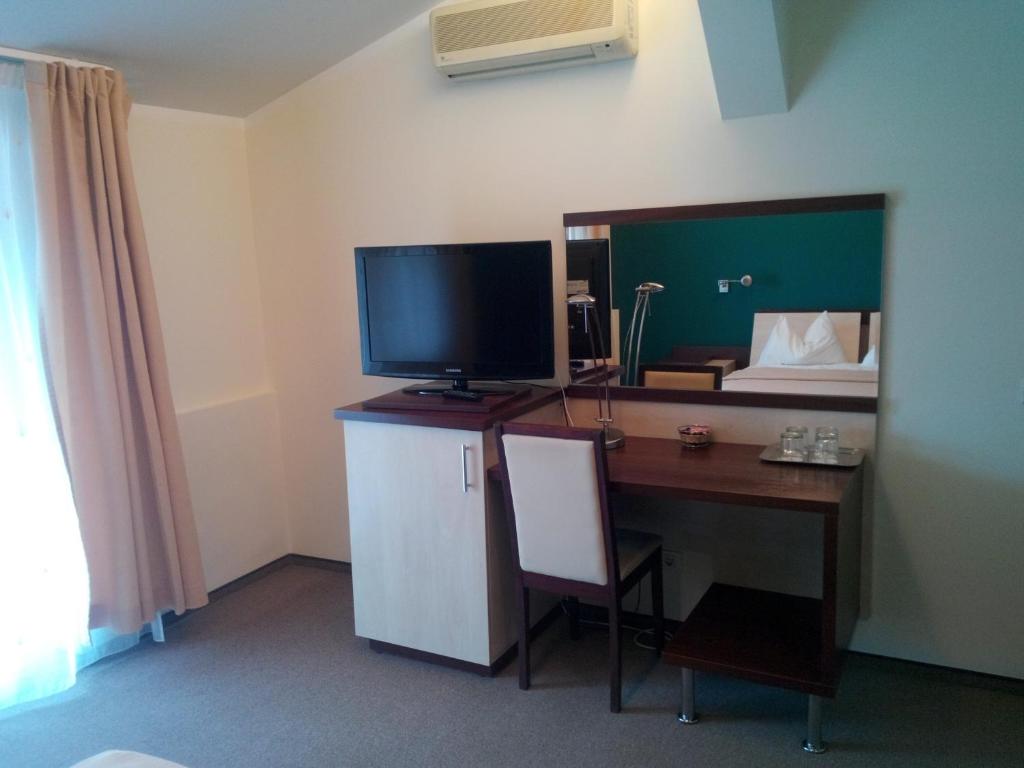 Kuchyň nebo kuchyňský kout v ubytování Hotel Baneasa Parc