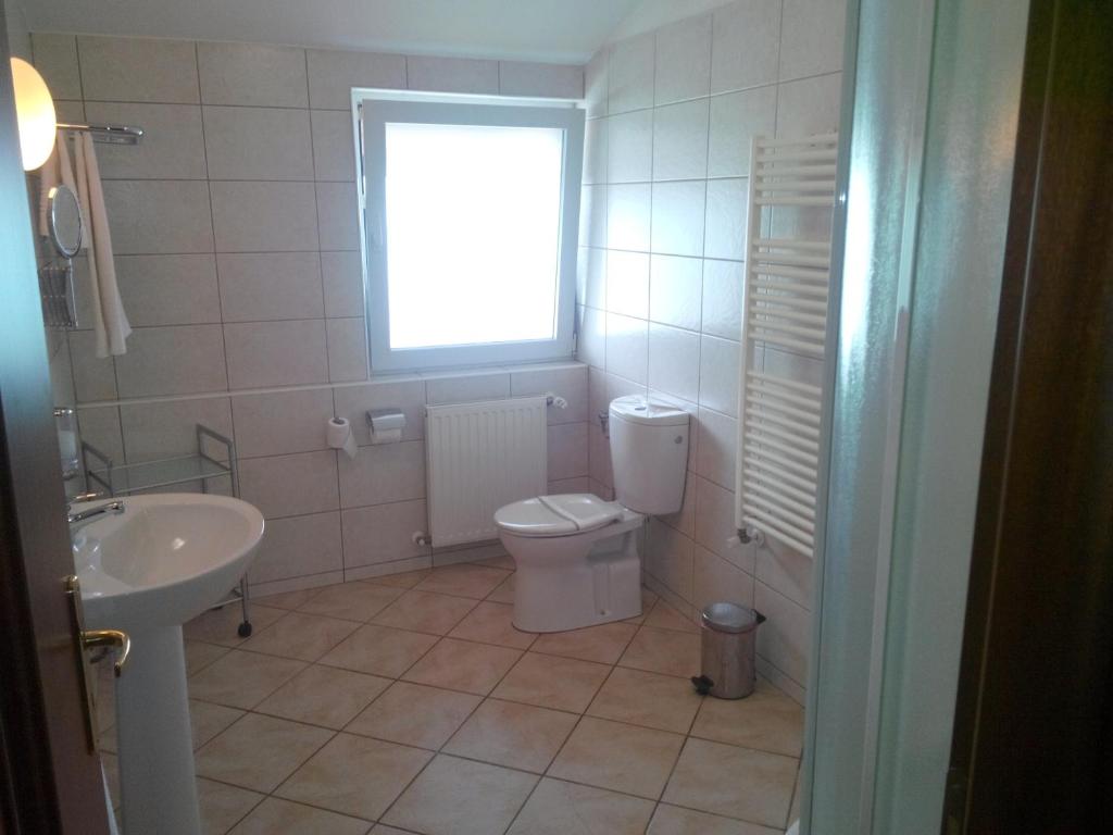 Koupelna v ubytování Hotel Baneasa Parc
