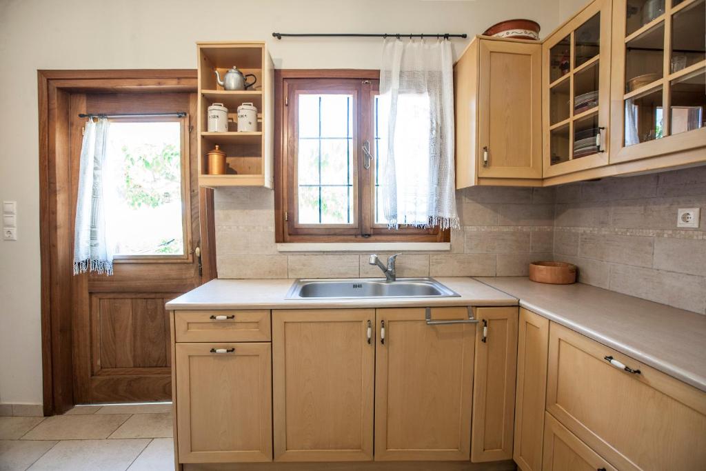 Kuchyň nebo kuchyňský kout v ubytování Villa Greco