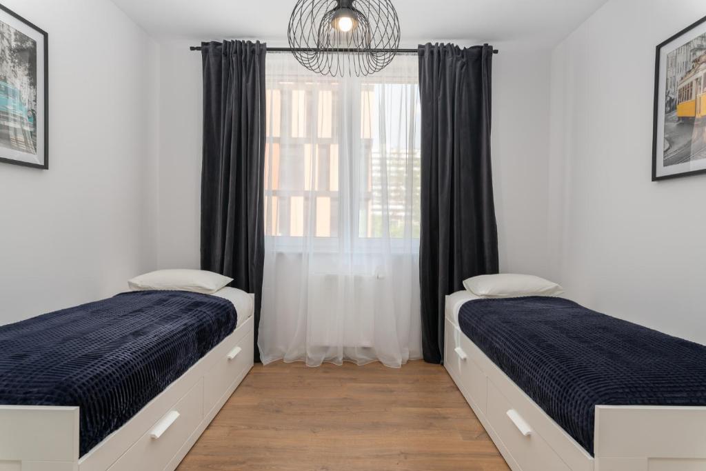 Posteľ alebo postele v izbe v ubytovaní Pure Home Apartments - Gwiaździsta