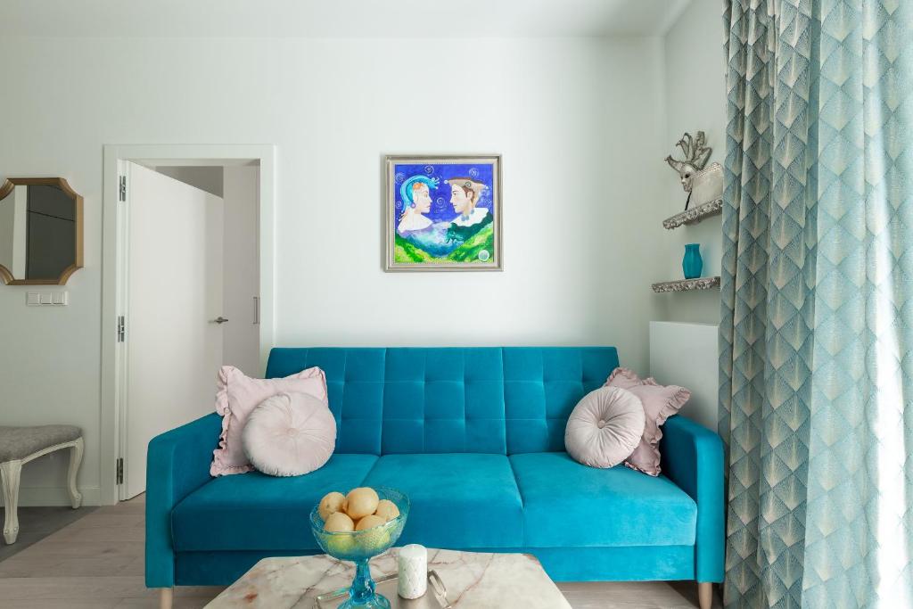 Posezení v ubytování Apartament Wenecja Błękitna - Młyn Maria - Art Apartments