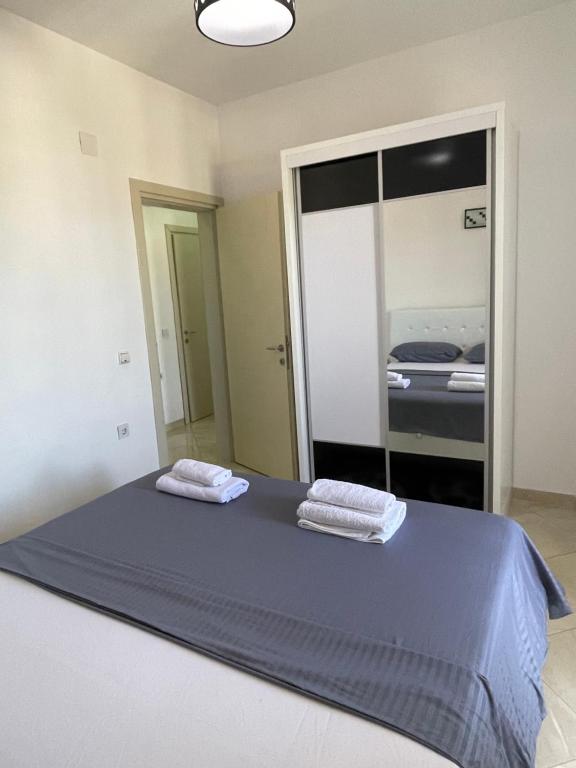 Postel nebo postele na pokoji v ubytování Queen Kodre Apartments