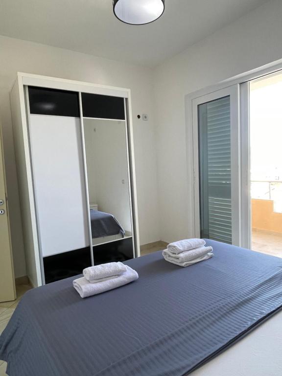 Postel nebo postele na pokoji v ubytování Queen Kodre Apartments