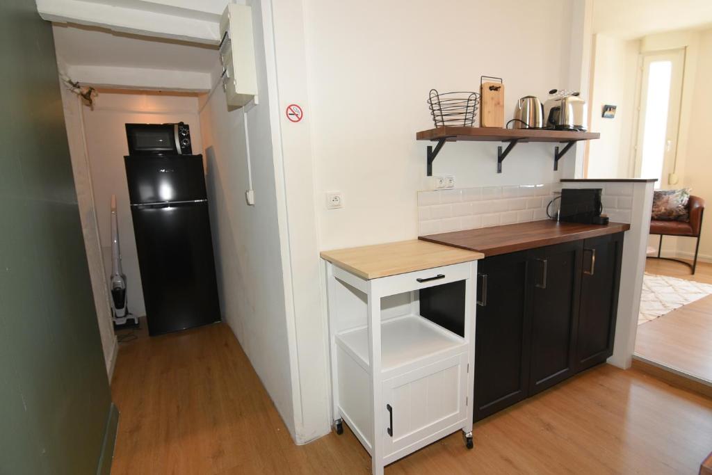Kuchnia lub aneks kuchenny w obiekcie L'Ango appartement triplex vue port