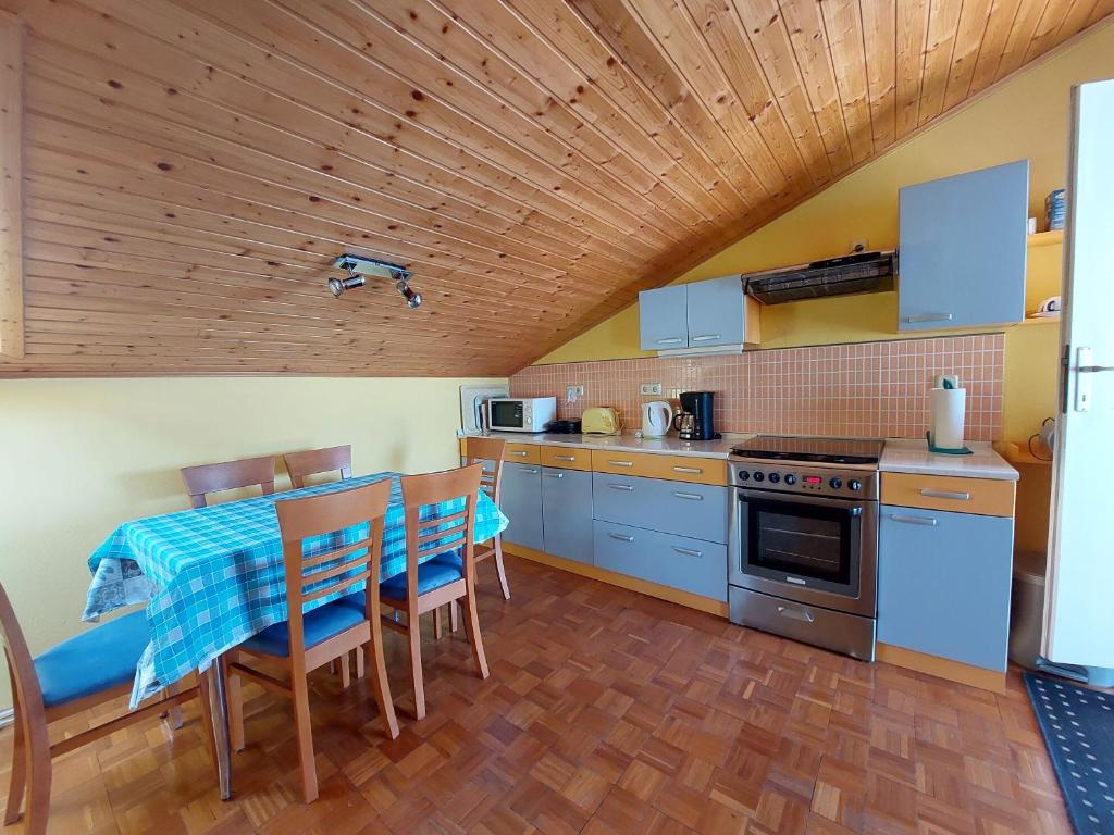Kuchyň nebo kuchyňský kout v ubytování Apartments Faran