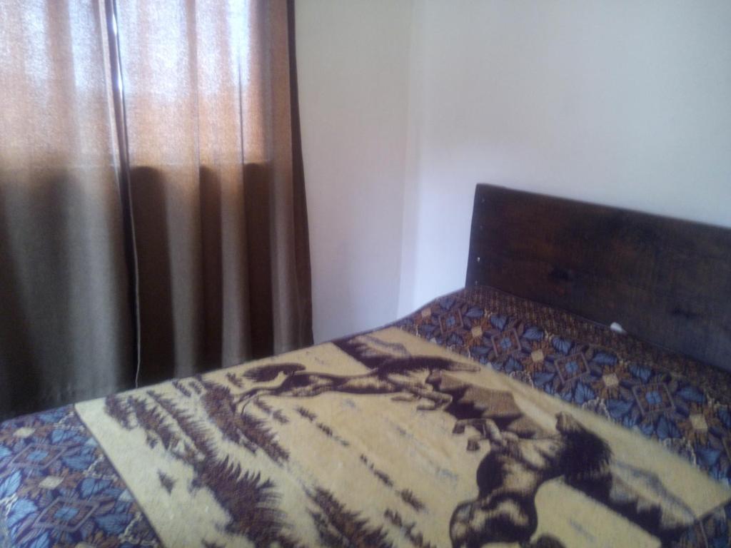 Postel nebo postele na pokoji v ubytování Posada Paraiso