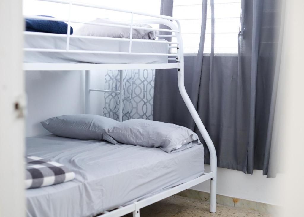Postel nebo postele na pokoji v ubytování Marina House