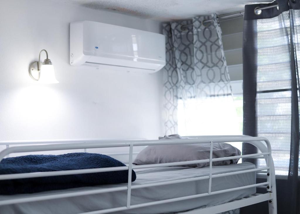 Postel nebo postele na pokoji v ubytování Marina House
