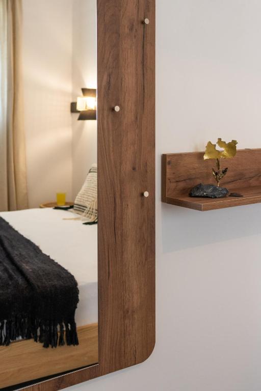 Postel nebo postele na pokoji v ubytování Kallia's Suites Milos