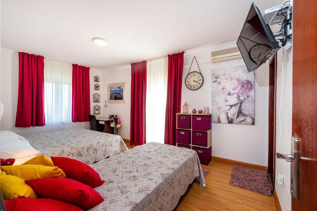 Postel nebo postele na pokoji v ubytování Villa Sunce