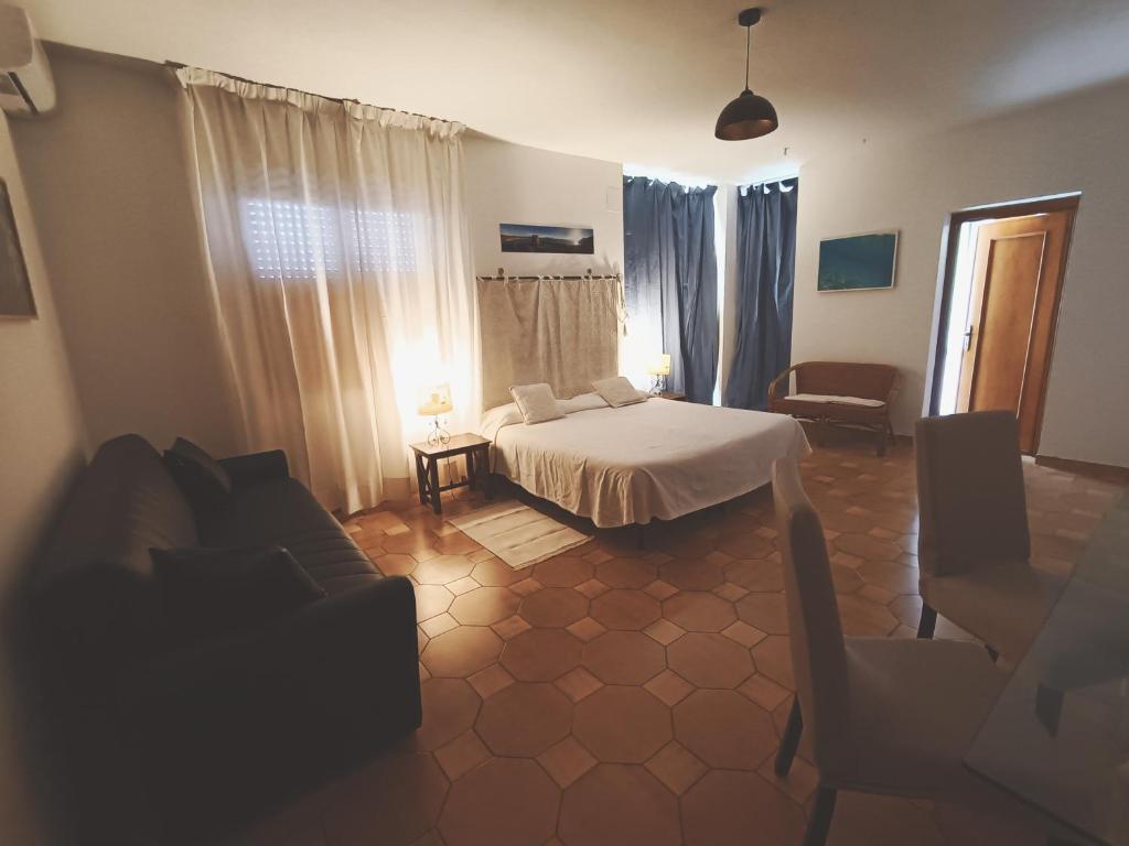 Postel nebo postele na pokoji v ubytování Antonhouse Alghero
